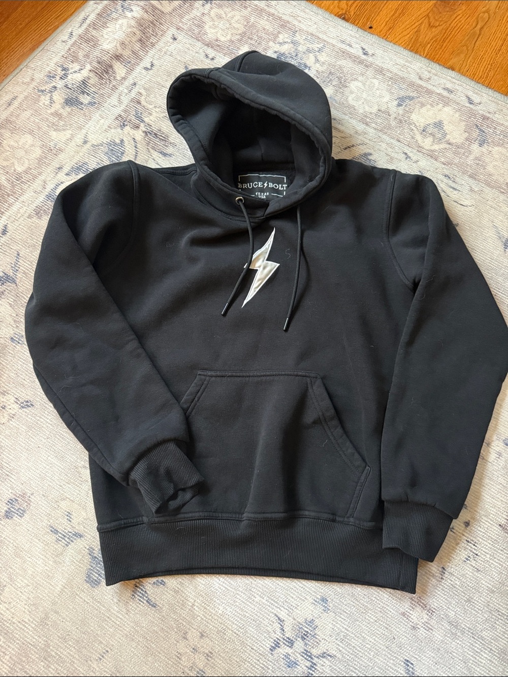 Bruce Bolt Kids' Black Hoodie with white Bolt Graphic
